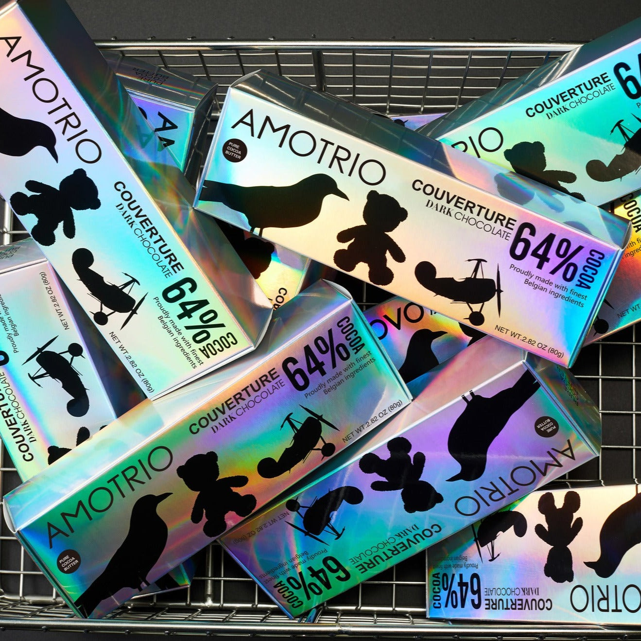 Fancy packaging of Amotrio 64% couverture dark chocolates in shopping cart