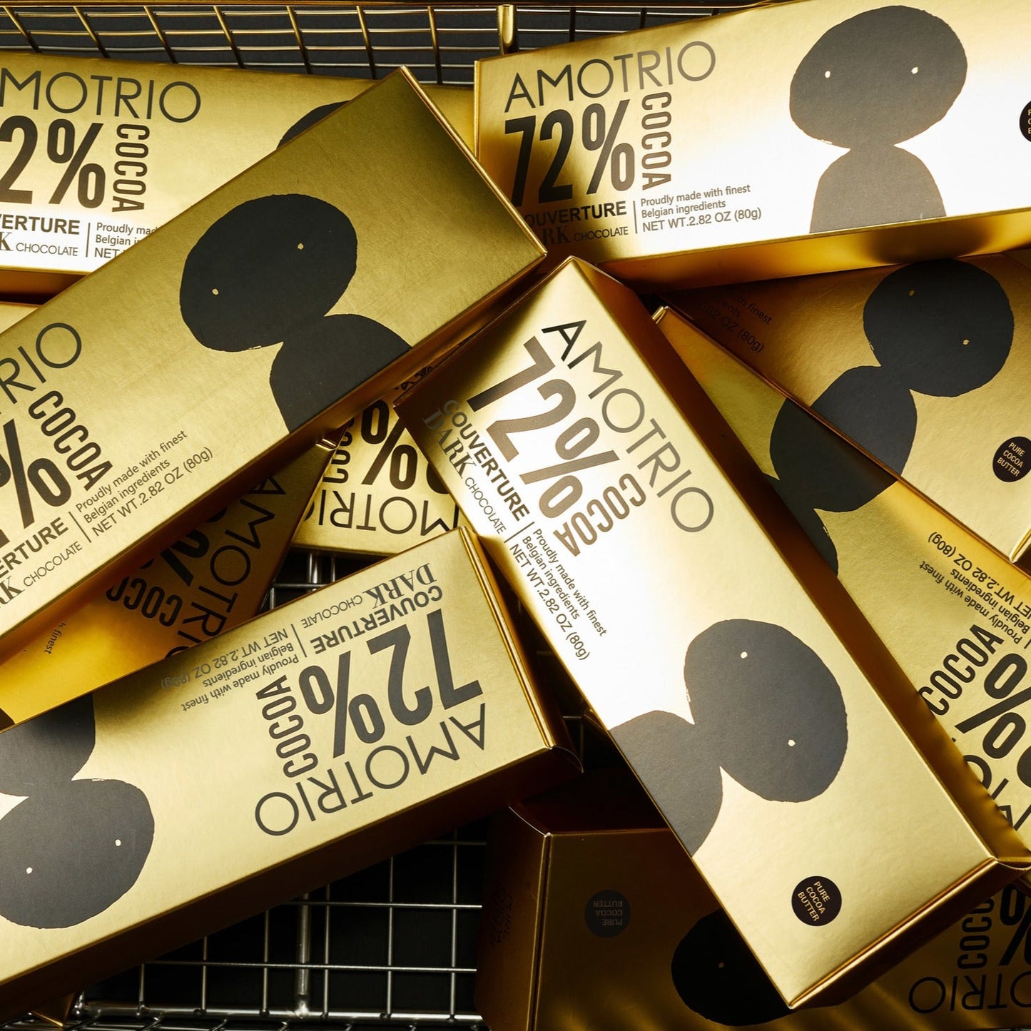 Fancy packaging of Amotrio 72% Couverture Dark Chocolates in shopping cart