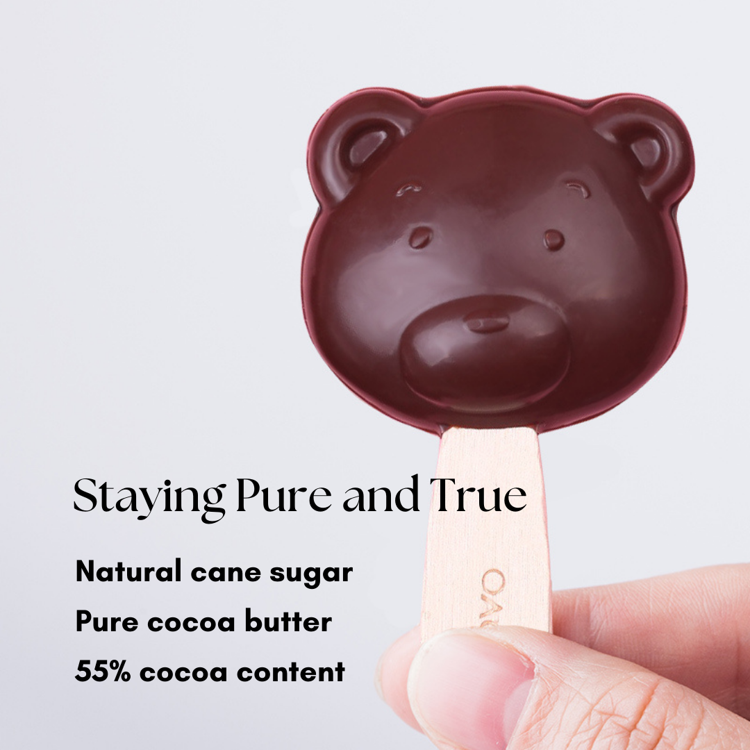 Perfect sweet bear-shaped dark chocolate lollipop made with pure cocoa butter