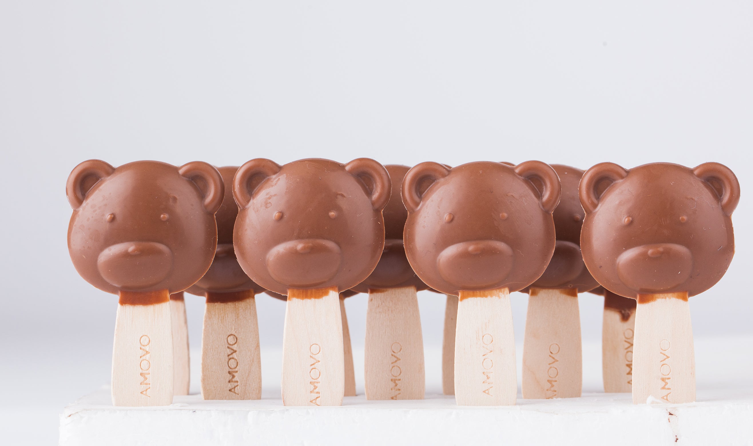 Amotrio milk chocolate bear lollipop, made shareable for parties, birthday gifts, shareable snacks, and