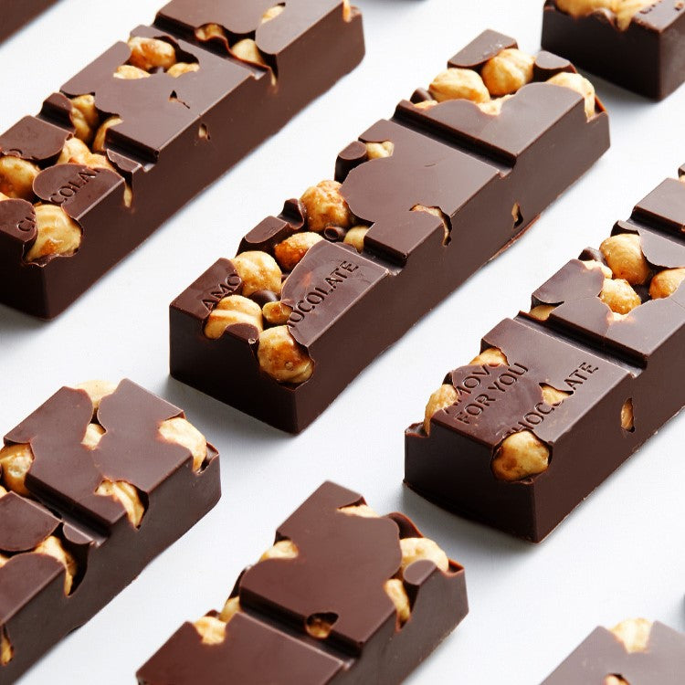 Real photo of Amotrio hazelnut chocolate bar with whole, uncut hazelnuts