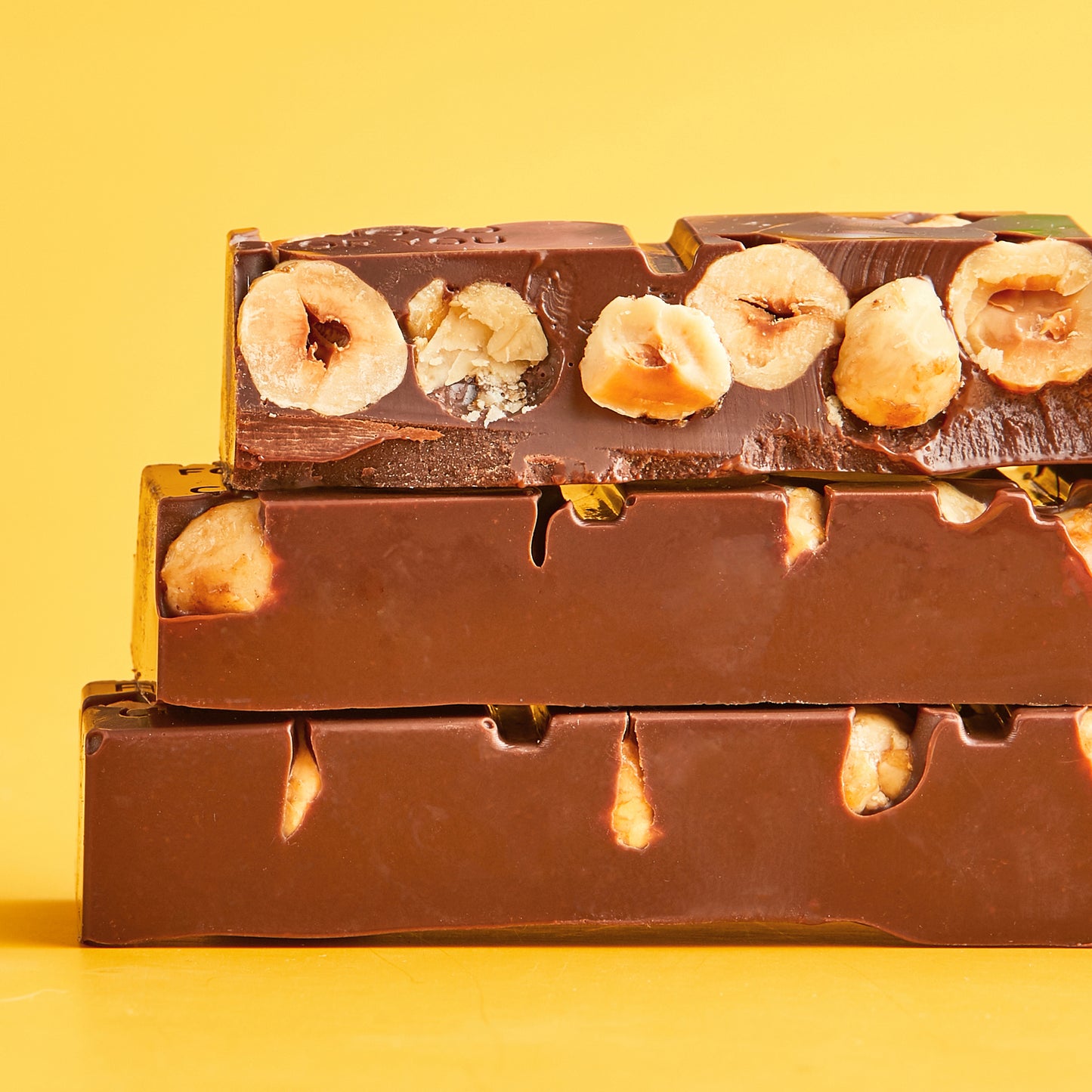 Whole hazelnuts covered with Belgian premium dark chocolate without sugar