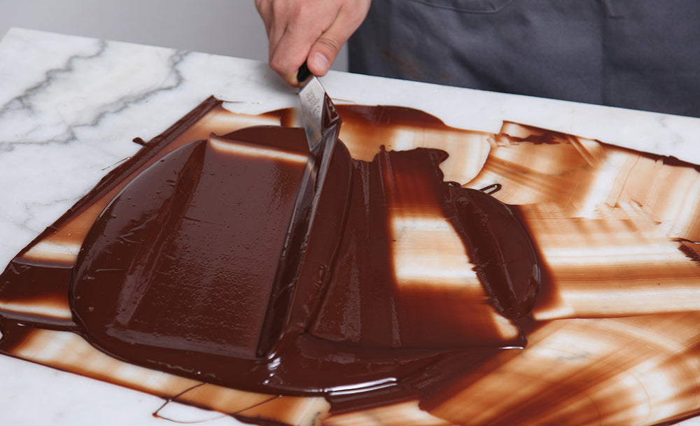 AMOTRIO's chocolate tempering to make sure a velvety, smooth, and rich textures