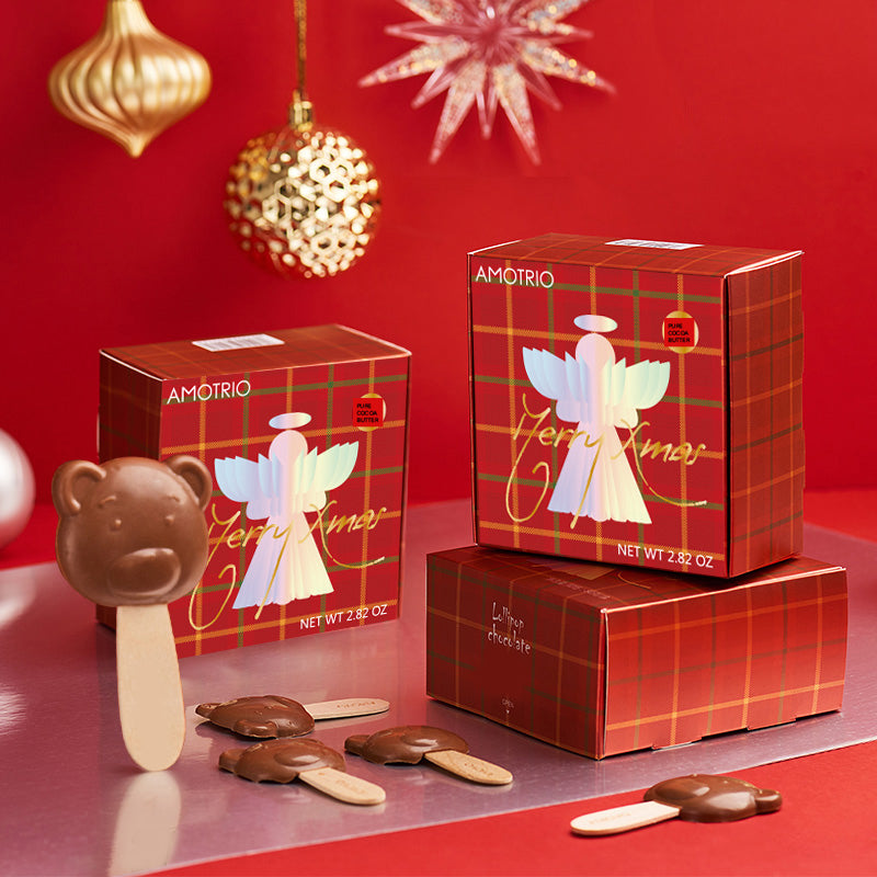 Bear-shaped milk chocolate lollipop with Christmas packaging