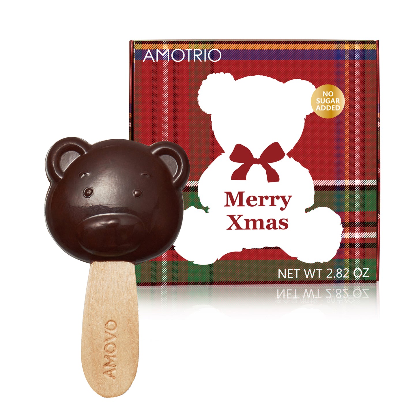 Photo of a bear shape dark chocolate lollipop and with the packaging behind